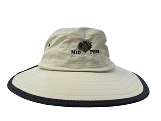 tan bucket hat with black rim